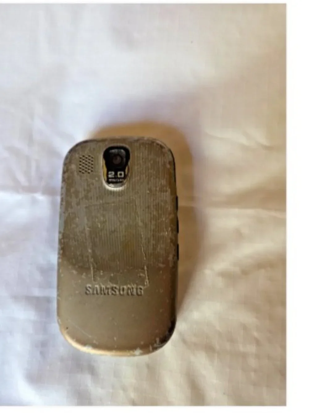 3 older cell phones-Nokia, Motorola, and Samsung
